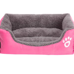 Plush nest-style dog bed available in multiple sizes
