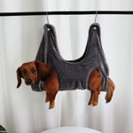 Dog nail trimming hammock for at-home grooming