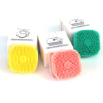 Dog shower brush with shampoo dispensing design