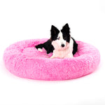 Plush donut pet bed available in multiple sizes